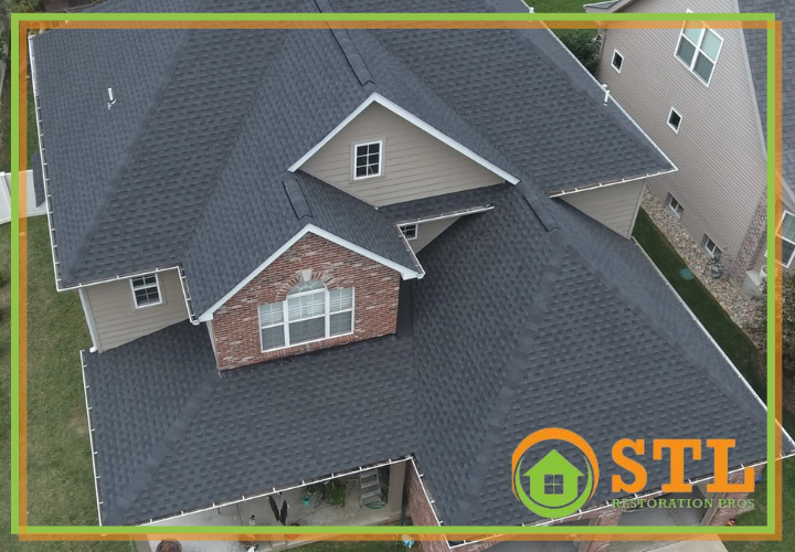 New GAF Timberline shingles from a local Ballwin roofing contractor are being installed on a residence.