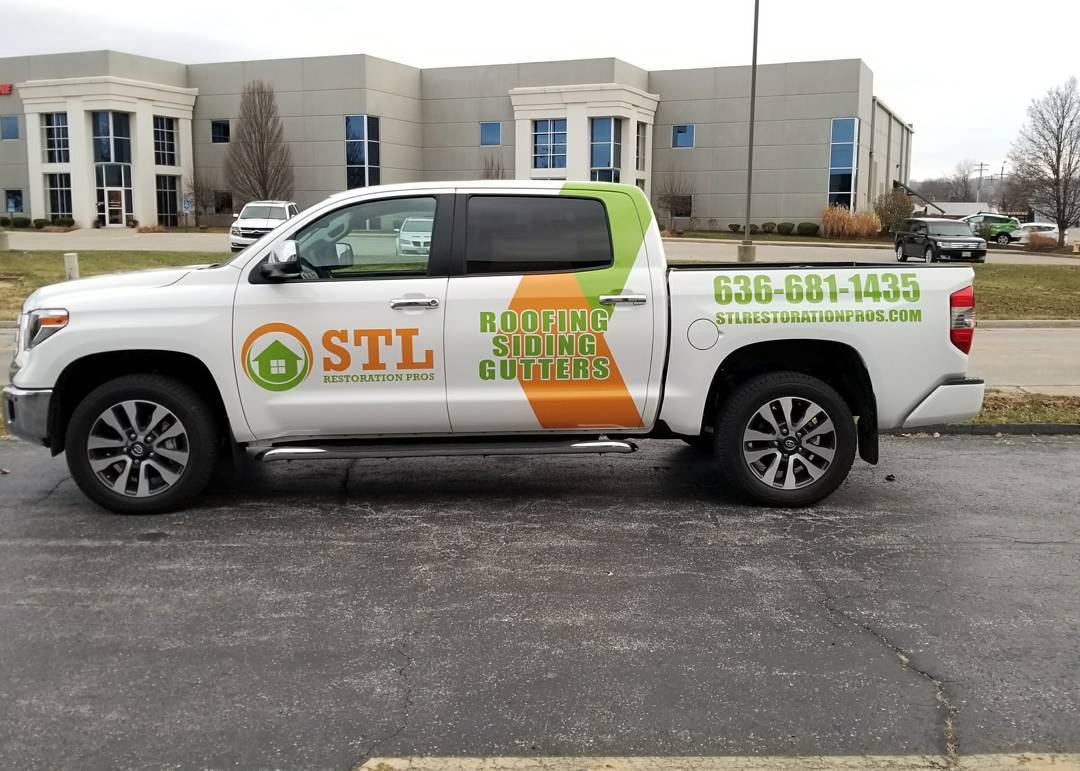 Side View Of STL Restoration Pros's Truck
